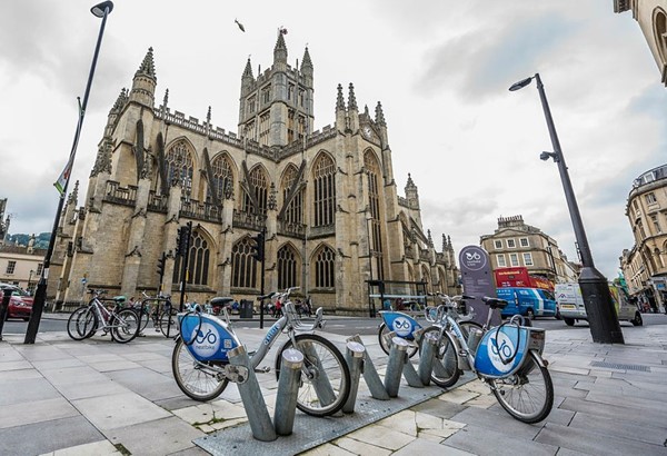 ebike park with Bath Abbey in the background
