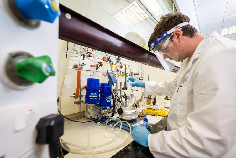 Ciaran Llewelyn working in a Chemistry lab